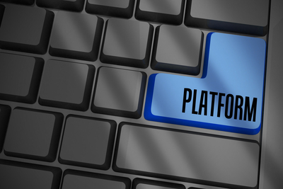 The word platform on black keyboard with blue key